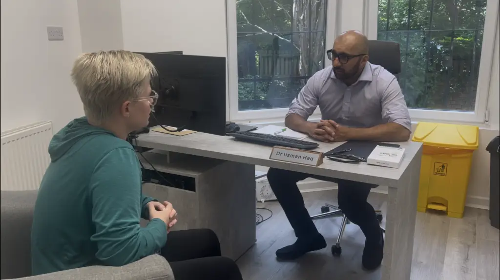 Patient speaking with a doctor during a menopause support consultation