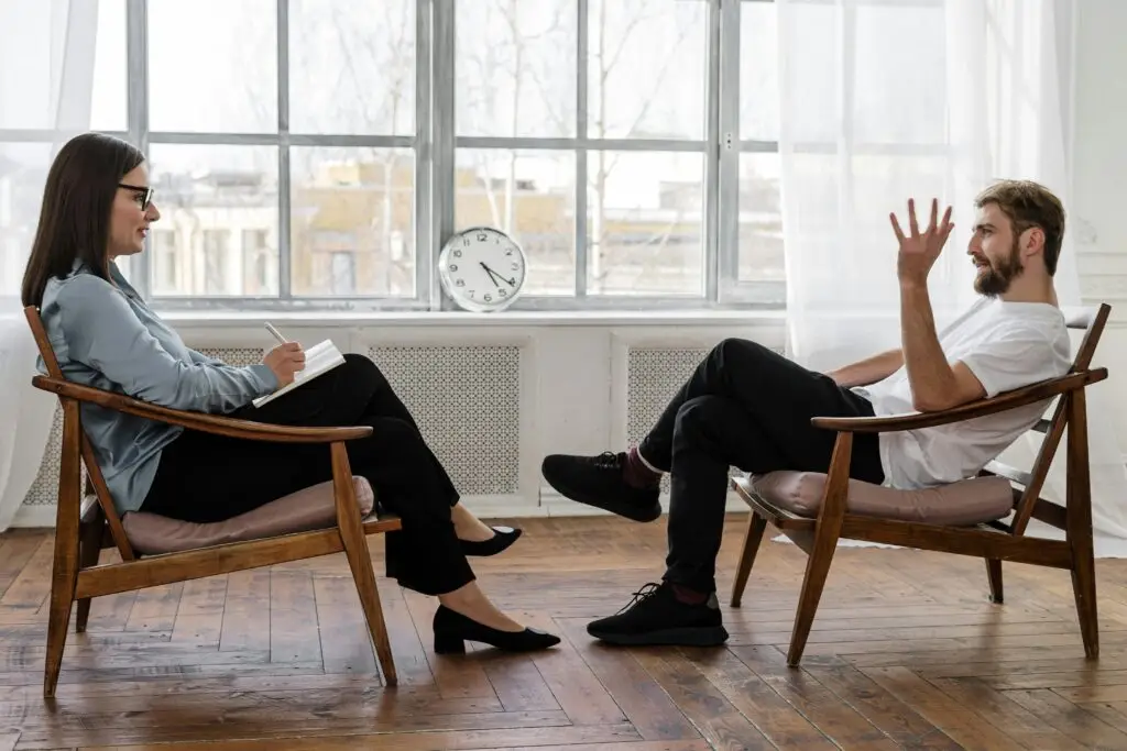 Patient talking with a mental health Doctor during a therapy session